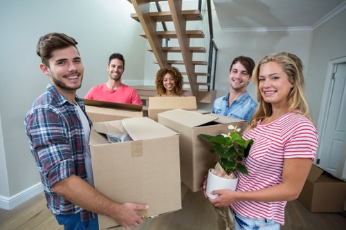 Office removal team preparing desks and boxes for relocation in Removalservices