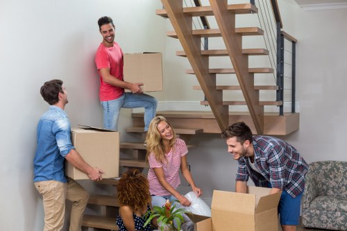 Man with van loading furniture for a local Removalservices move