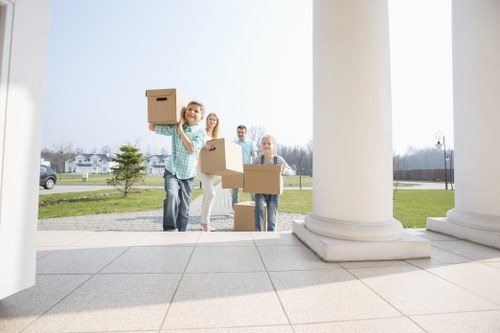 Removalists loading household furniture for a local house move