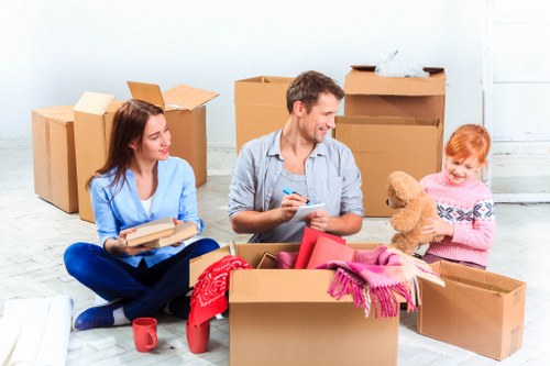 Careful boxing and labeling of household items during a move