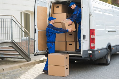 Prepared boxes and furniture for a house move by local movers