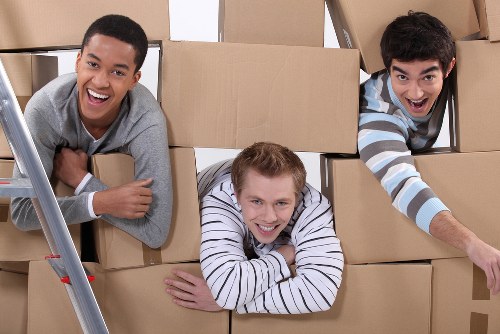Removal team loading furniture for a local move in Removalservices