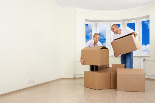 Packed office equipment and boxes ready for a business relocation service