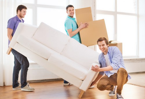 Staff checking details in a removals complaints process
