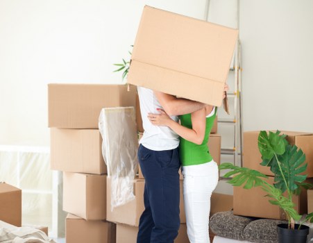 Business relocation setup with labelled boxes and desks