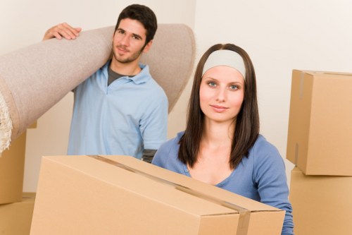 Commercial office relocation with desks and equipment being moved